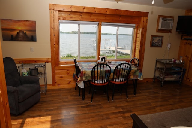 39887 195th St, Clitherall Twp, MN 56524 - dining room featuring wood finished floors, a wall mounted AC, and a ceiling fan