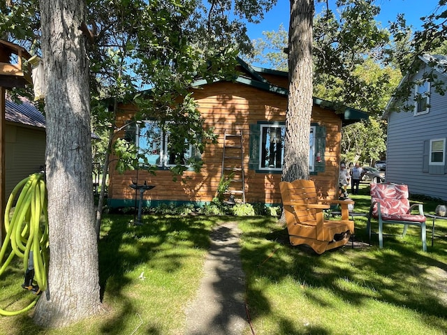 23979 Navajo Trl, Henning, MN 56551 - view of front facade featuring a front yard