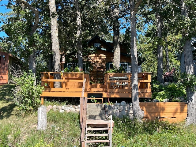 23979 Navajo Trl, Henning, MN 56551 - rear view of house featuring a deck