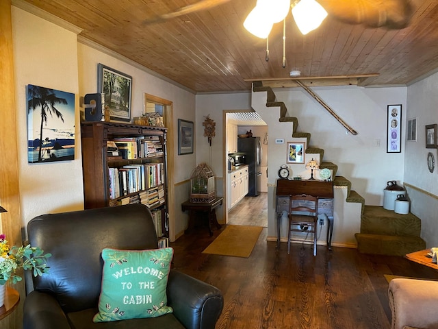 23979 Navajo Trl, Henning, MN 56551 - living area featuring wooden ceiling, wood finished floors, stairs, ornamental molding, and a ceiling fan
