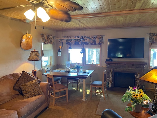 23979 Navajo Trl, Henning, MN 56551 - dining room with wooden ceiling, healthy amount of natural light, ceiling fan, and a fireplace