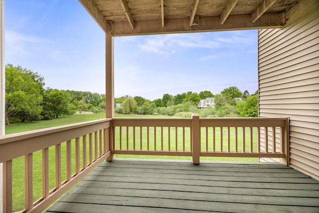 4277 Oakmede Ln Unit 62C, White Bear Twp, MN 55110 - wooden deck featuring view of wooded area