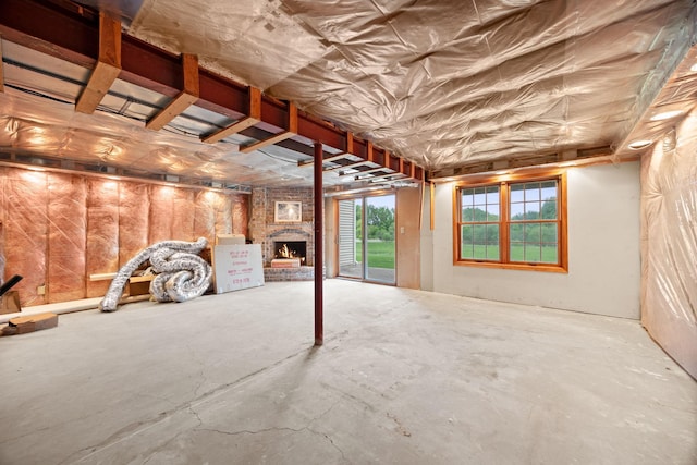 4277 Oakmede Ln Unit 62C, White Bear Twp, MN 55110 - basement with a brick fireplace