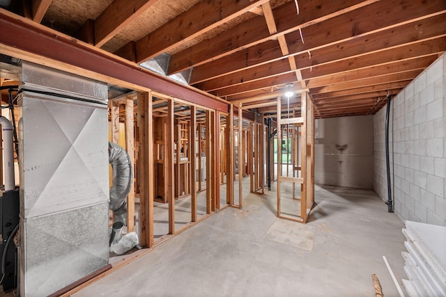 4277 Oakmede Ln Unit 62C, White Bear Twp, MN 55110 - basement featuring heating unit and concrete block wall