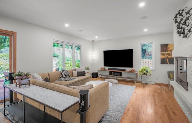 4744 Westgate Rd, Minnetonka, MN 55345 - living area featuring recessed lighting, light wood-style flooring, and a fireplace