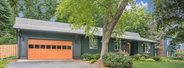 4744 Westgate Rd, Minnetonka, MN 55345 - view of front of property featuring an attached garage, driveway, and roof with shingles