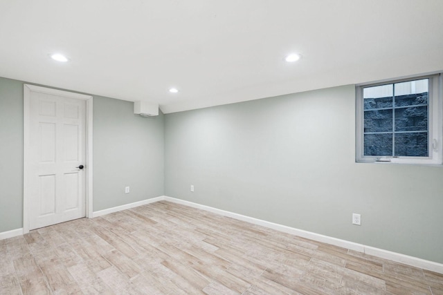 5078 Vine Hill Rd, Deephaven, MN 55331 - finished below grade area featuring wood finished floors, baseboards, and recessed lighting