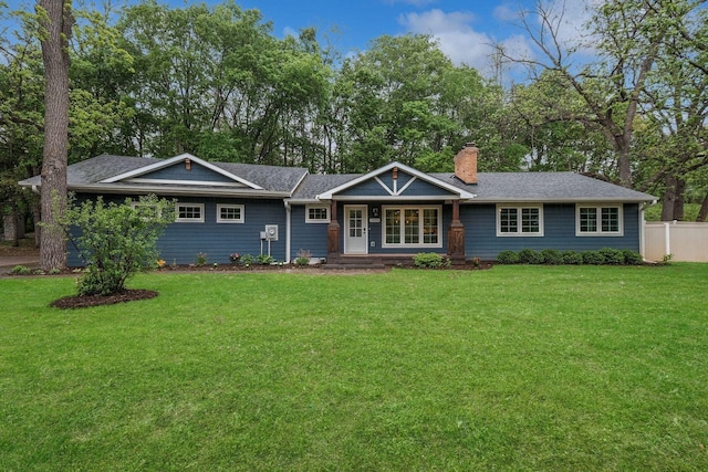 5078 Vine Hill Rd, Deephaven, MN 55331 - ranch-style house with a chimney, covered porch, and roof with shingles