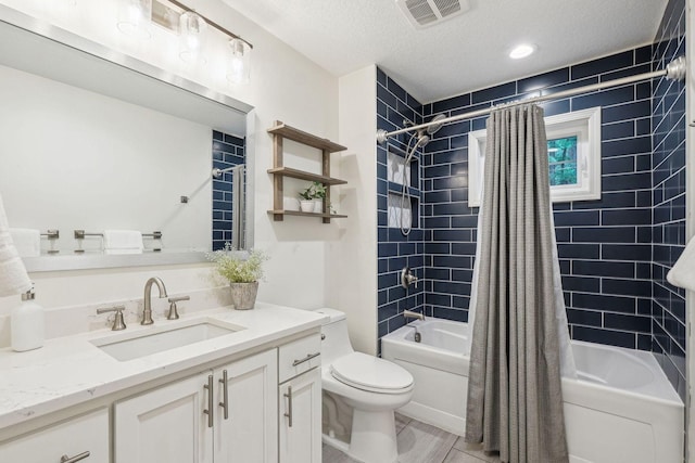 5078 Vine Hill Rd, Deephaven, MN 55331 - bathroom featuring shower / bath combo, toilet, a textured ceiling, and vanity