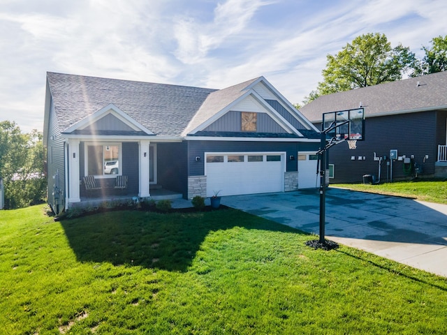 1004 Blanch Ct, Mantorville, MN 55955 - view of front of property featuring a porch, concrete driveway, a front yard, and a garage
