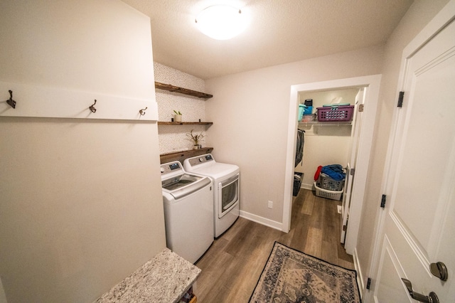 1004 Blanch Ct, Mantorville, MN 55955 - washroom with washing machine and dryer, dark wood-type flooring, and baseboards