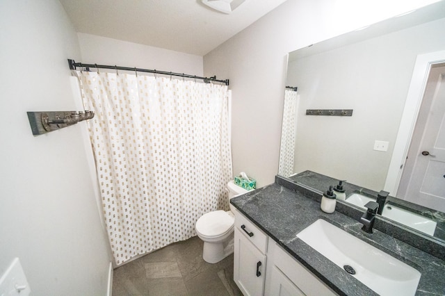 1004 Blanch Ct, Mantorville, MN 55955 - bathroom with toilet, vanity, and curtained shower