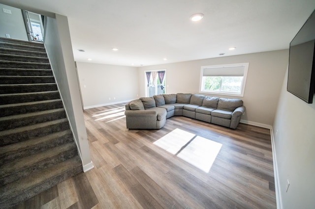 1004 Blanch Ct, Mantorville, MN 55955 - living area featuring stairway, light wood-style floors, recessed lighting, and baseboards
