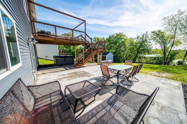 1004 Blanch Ct, Mantorville, MN 55955 - view of patio / terrace featuring stairs, outdoor dining area, and a wooden deck