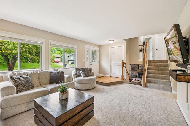 1686 Walnut Ln, Eagan, MN 55122 - carpeted living area featuring stairway and baseboards