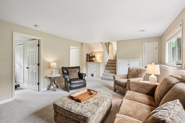 1686 Walnut Ln, Eagan, MN 55122 - carpeted living room with stairway and baseboards