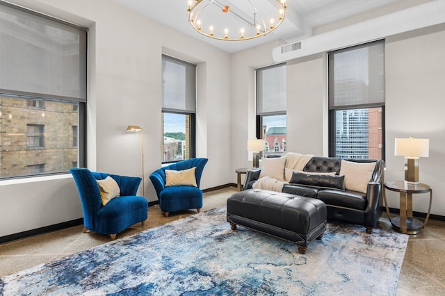 350 Saint Peter St Unit 701, Saint Paul, MN 55102 - living room with a chandelier and baseboards