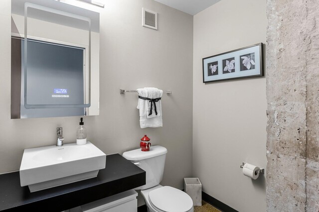 350 Saint Peter St Unit 701, Saint Paul, MN 55102 - bathroom featuring toilet and vanity