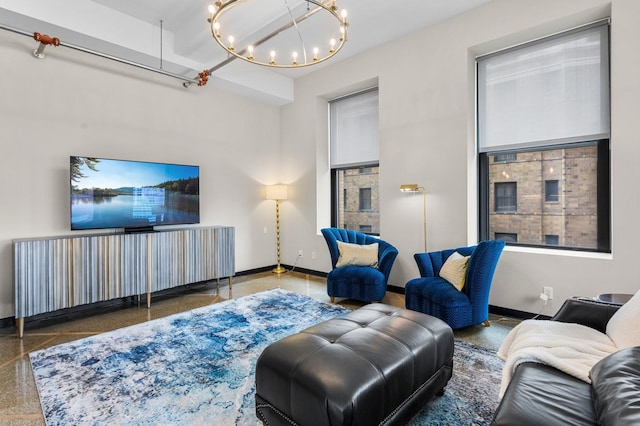 350 Saint Peter St Unit 701, Saint Paul, MN 55102 - living room featuring baseboards and a chandelier