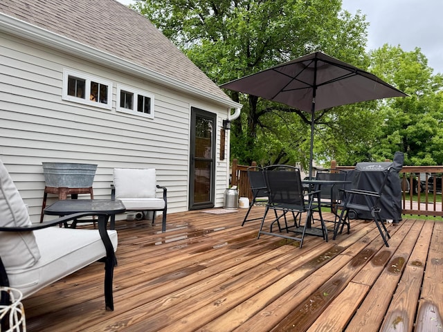 2728 Pine Ave, Slayton, MN 56172 - wooden terrace with outdoor dining space