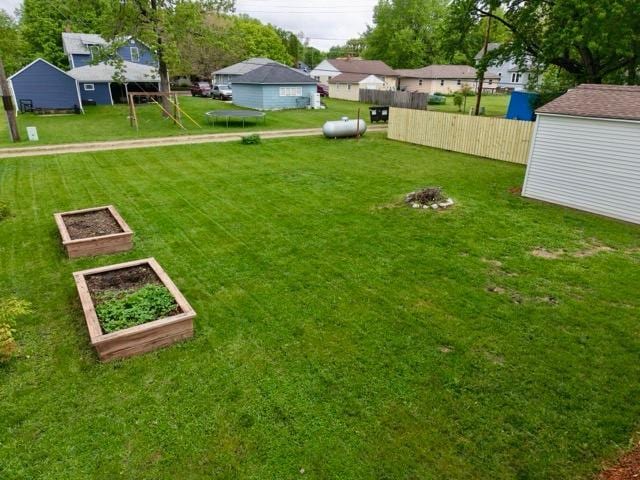 2728 Pine Ave, Slayton, MN 56172 - view of yard with a residential view and a garden