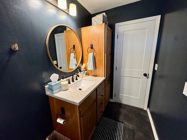 2728 Pine Ave, Slayton, MN 56172 - bathroom with vanity and baseboards