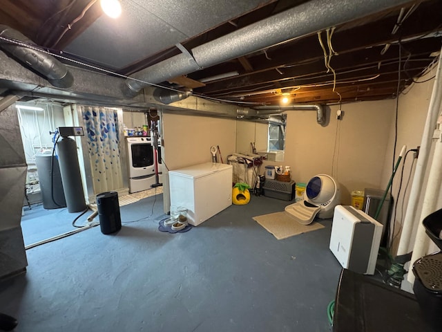 2728 Pine Ave, Slayton, MN 56172 - unfinished basement featuring fridge and a water softener
