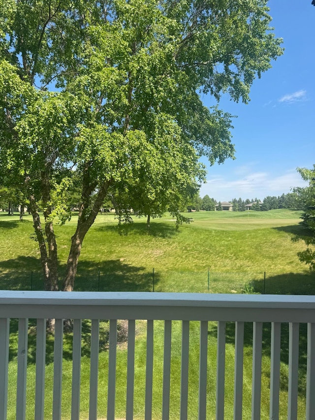 10973 Nassau Cir NE, Blaine, MN 55449 - view of grassy yard featuring a balcony and view of golf course