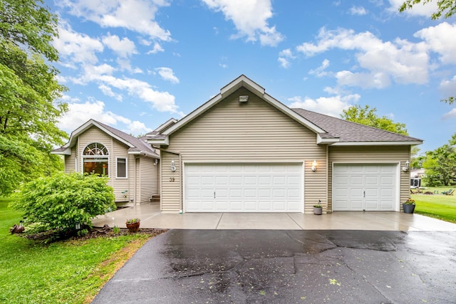 39 154th Ave NE, Ham Lake, MN 55304 - ranch-style home with driveway, an attached garage, and a front yard