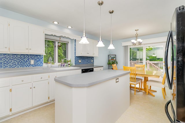 39 154th Ave NE, Ham Lake, MN 55304 - kitchen with black appliances, a sink, backsplash, white cabinetry, and recessed lighting