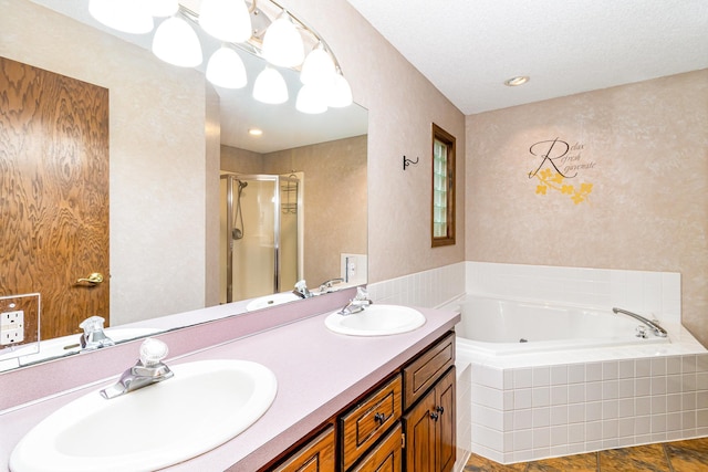 39 154th Ave NE, Ham Lake, MN 55304 - bathroom with a shower stall, a garden tub, and double vanity