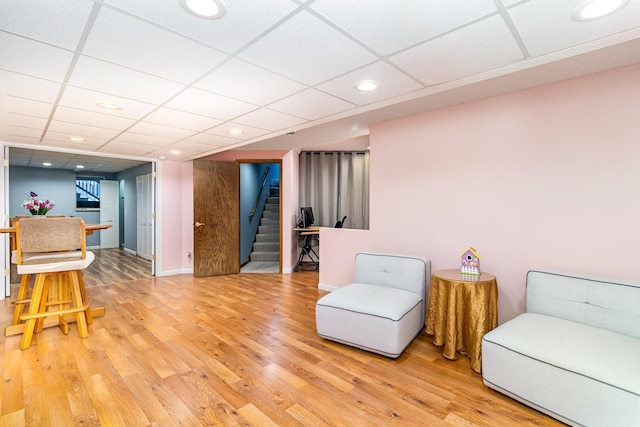 39 154th Ave NE, Ham Lake, MN 55304 - living area with stairs, light wood-style floors, a drop ceiling, recessed lighting, and baseboards