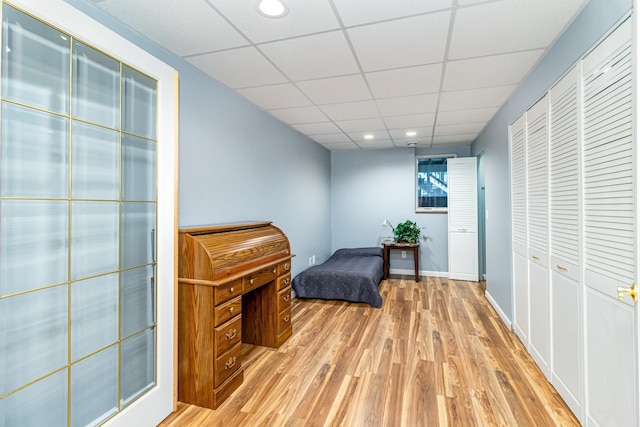 39 154th Ave NE, Ham Lake, MN 55304 - bedroom featuring light wood finished floors, a closet, a drop ceiling, and recessed lighting