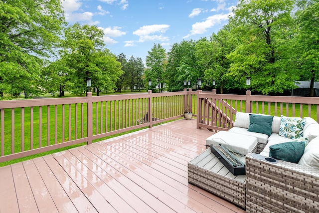 39 154th Ave NE, Ham Lake, MN 55304 - wooden terrace featuring an outdoor hangout area, a lawn, and view of wooded area