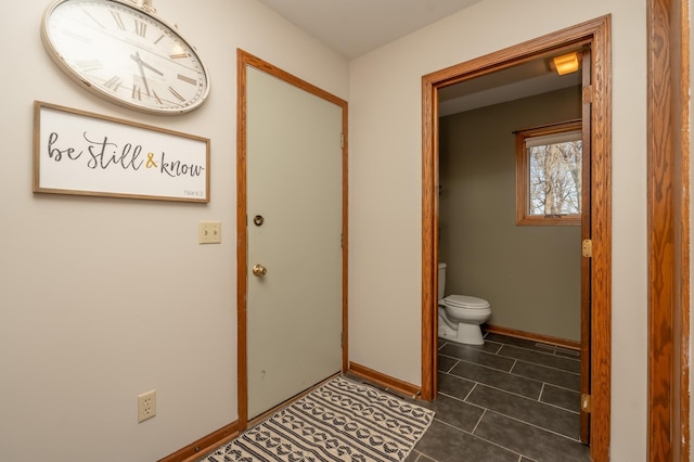 36350 276th St, Henderson, MN 56044 - bathroom featuring toilet, tile patterned floors, and baseboards