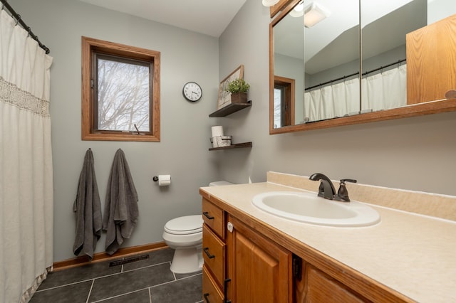 36350 276th St, Henderson, MN 56044 - full bathroom featuring tile patterned floors, toilet, vanity, and baseboards