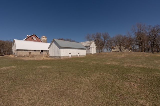 36350 276th St, Henderson, MN 56044 - view of grassy yard with an outdoor structure and an outbuilding