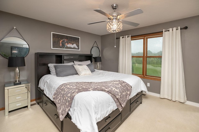 907 Rodeo Dr SE, Pine Island, MN 55963 - bedroom with light colored carpet, baseboards, and a ceiling fan