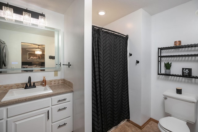 907 Rodeo Dr SE, Pine Island, MN 55963 - bathroom with toilet, vanity, curtained shower, recessed lighting, and baseboards