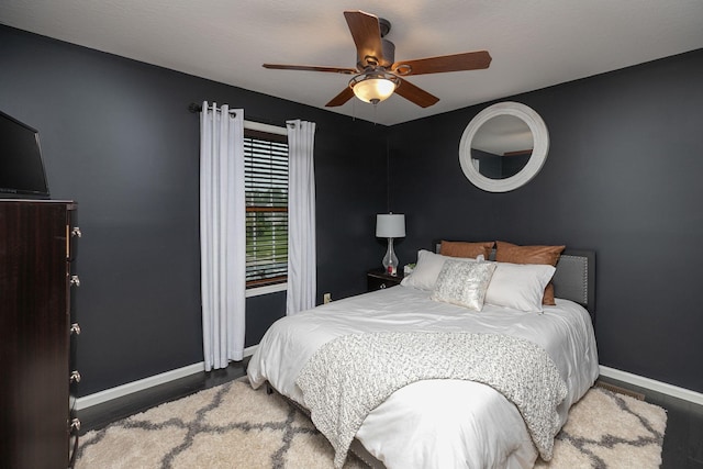 907 Rodeo Dr SE, Pine Island, MN 55963 - bedroom with baseboards, wood finished floors, and ceiling fan