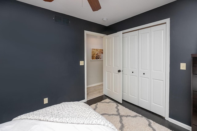 907 Rodeo Dr SE, Pine Island, MN 55963 - bedroom with a closet, baseboards, and a ceiling fan