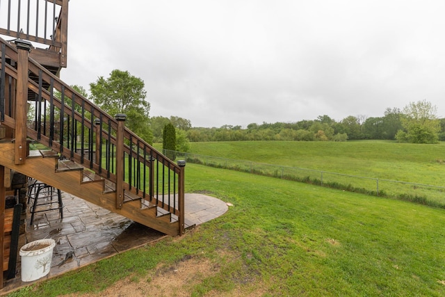 907 Rodeo Dr SE, Pine Island, MN 55963 - view of yard with stairway and a view of rural / pastoral area