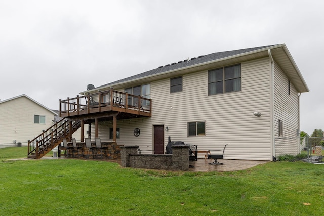 907 Rodeo Dr SE, Pine Island, MN 55963 - rear view of property featuring stairway, a wooden deck, a yard, and a patio area
