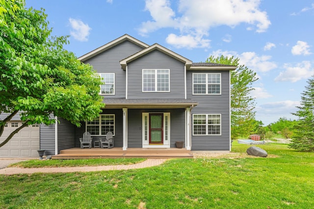 27385 Millicent Ln, Chisago Lake Twp, MN 55013 - traditional-style house featuring covered porch, a front lawn, and an attached garage