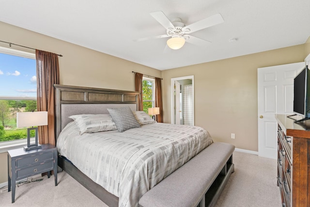 27385 Millicent Ln, Chisago Lake Twp, MN 55013 - bedroom featuring light colored carpet, baseboards, and a ceiling fan
