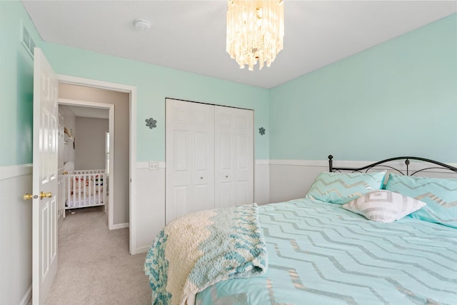 27385 Millicent Ln, Chisago Lake Twp, MN 55013 - carpeted bedroom featuring a chandelier and a closet