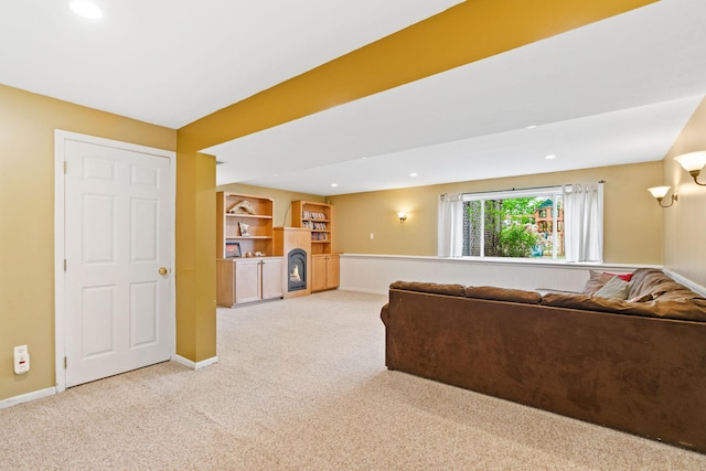 27385 Millicent Ln, Chisago Lake Twp, MN 55013 - living area with light carpet, a lit fireplace, baseboards, and recessed lighting