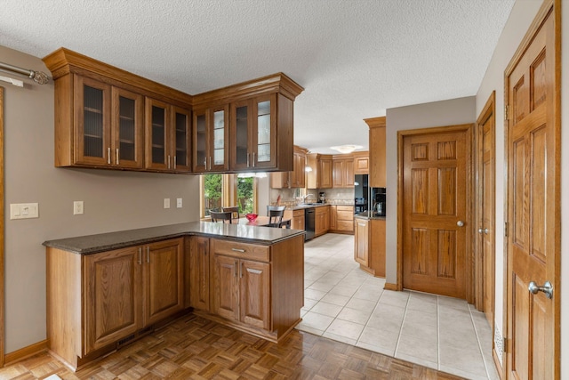 500 Mackubin Cir, Shoreview, MN 55126 - kitchen with dishwasher, a peninsula, glass insert cabinets, brown cabinets, and a textured ceiling