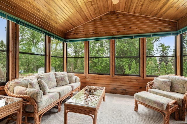 500 Mackubin Cir, Shoreview, MN 55126 - living area with vaulted ceiling, wooden walls, a ceiling fan, carpet flooring, and wooden ceiling