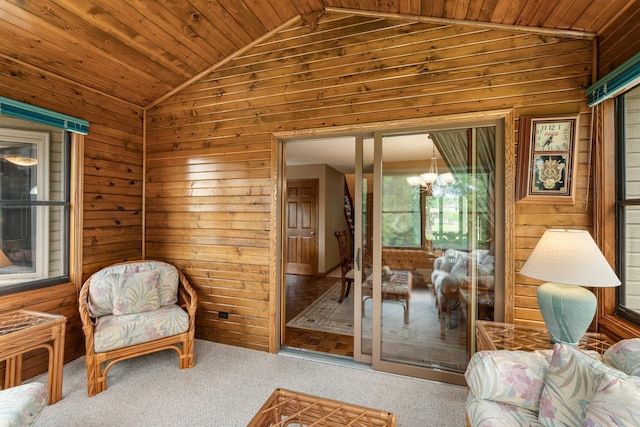 500 Mackubin Cir, Shoreview, MN 55126 - sitting room featuring lofted ceiling, wooden walls, carpet floors, a chandelier, and wood ceiling